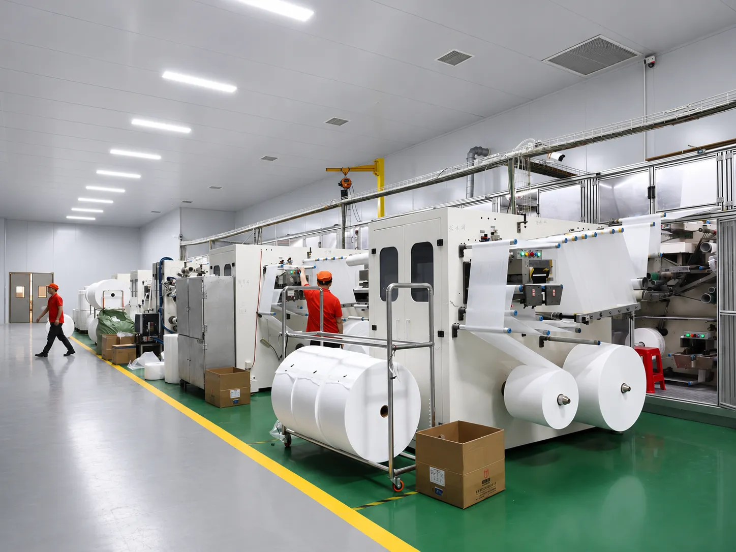 Multi-line automated nonwoven and film converting facility for hygiene material manufacturing - urightmaterials